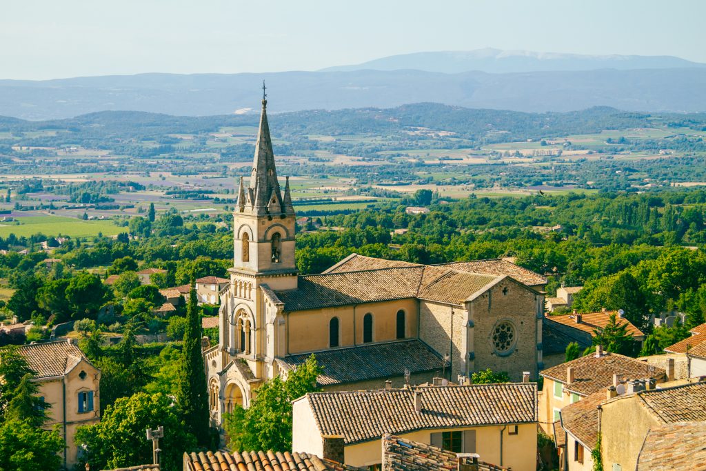 the church spire rising above the village of Bonnieux in the Luberon of Provence